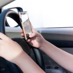 Abu Dhabi Police mobile phone driving ban 2025