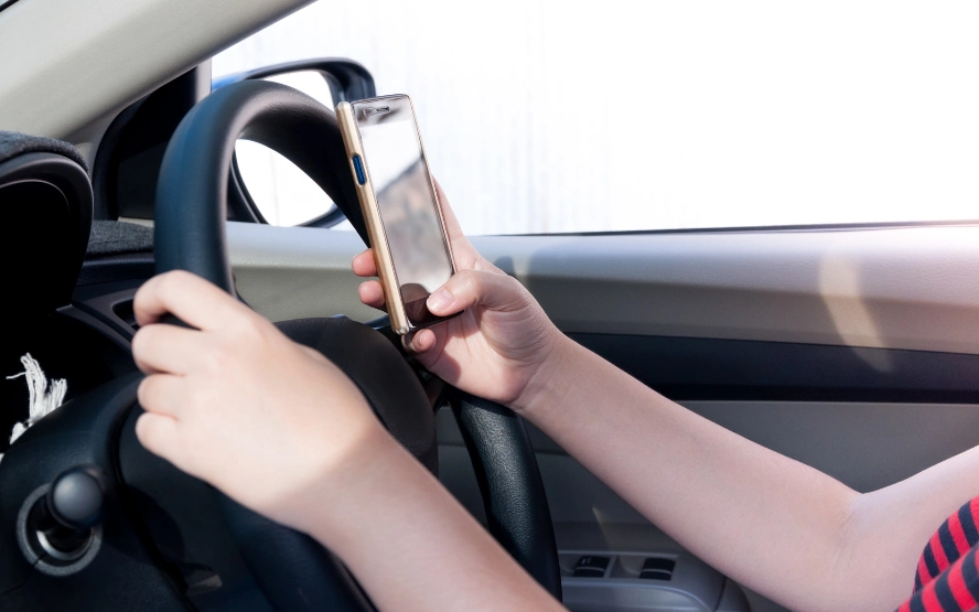 Abu Dhabi Police mobile phone driving ban 2025