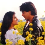 Shah Rukh Khan and Kajol in a romantic scene from Dilwale Dulhania Le Jayenge, symbolizing the film's enduring legacy. Dilwale Dulhania Le Jayenge Celebrates